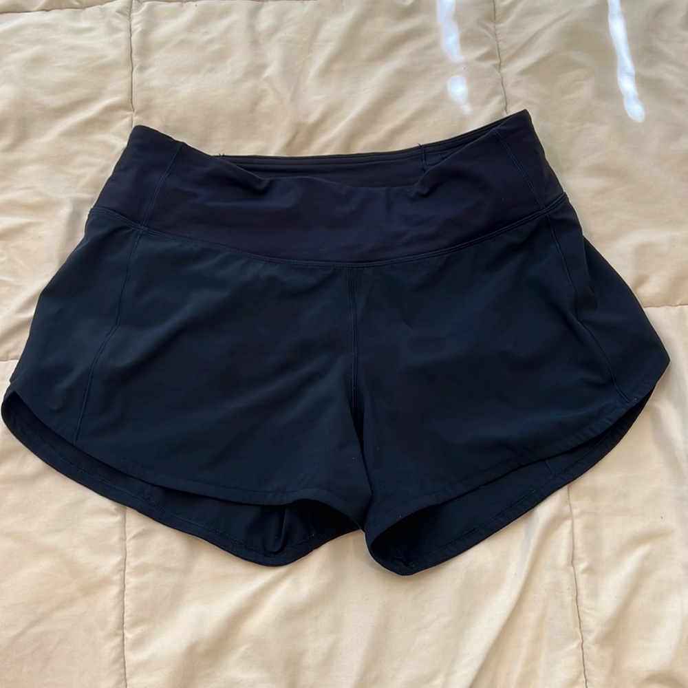 Navy lululemon run times shorts. 4 in. TALL